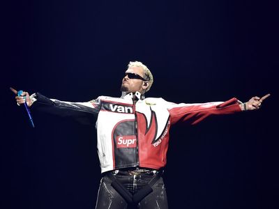 Chris Brown filmed holding female fans by the neck in onstage routine