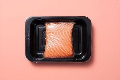 What gives salmon its distinctive color?