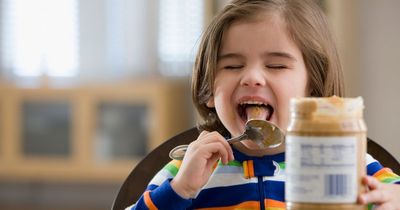 Babies should be given peanut butter early to ward off allergies, scientists say