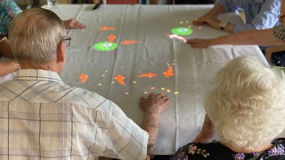 'Magic tables' help change lives of aged care residents living with dementia