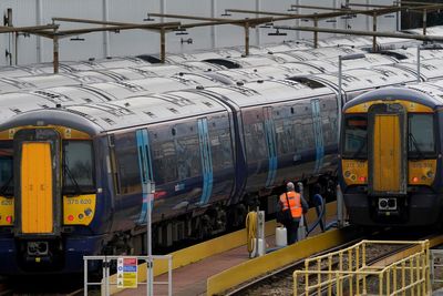 Train passengers face disruption as rail workers strike in pay and jobs row