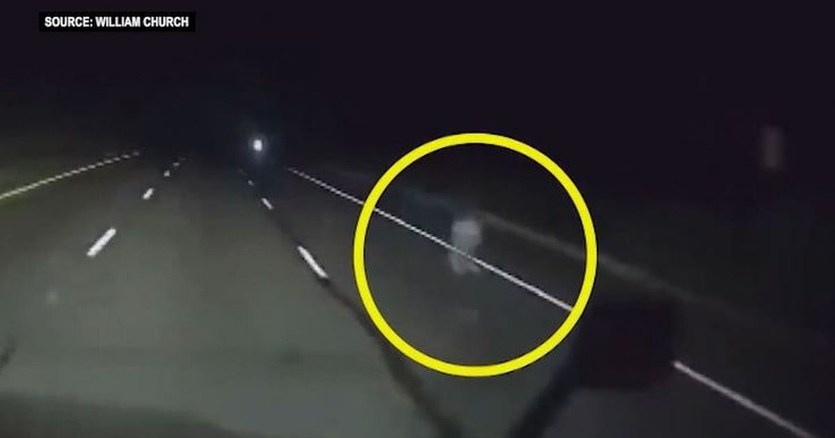 Moment creepy ghost-like figure spotted on road while…