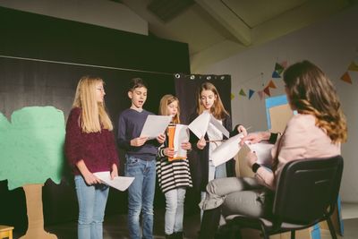 Meet the 25-year-old theater educator juggling multiple side gigs to make ends meet