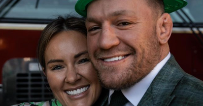 Conor McGregor and Dee Devlin all smiles as they enjoy St Patrick's Day Stateside