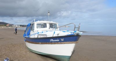 Mystery as abandoned boat washes up on UK beach sparking search for people on board