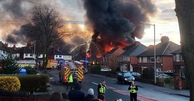 Blaze sends black smoke billowing across sky as families evacuated
