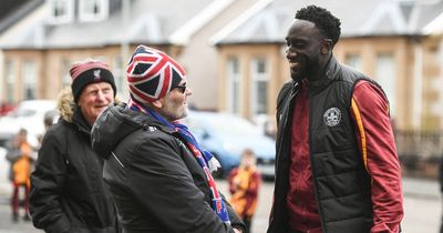Rangers fan question tickles Motherwell star Bevis Mugabi as he explains pre-game pic