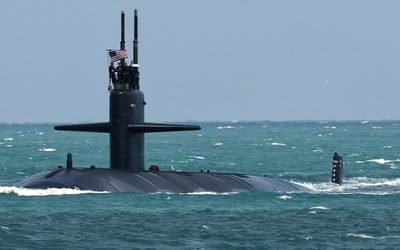 AUKUS submarines deal draws a stinging response from Beijing