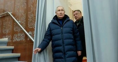 Vladimir Putin visits occupied Ukrainian city just days after warrant issued for arrest