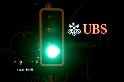 UBS, Credit Suisse lock horns in takeover talks