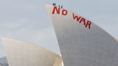 Australian War Memorial reveals new Iraq War gallery will showcase 'NO WAR' Sydney Opera House protest items alongside fighter jet