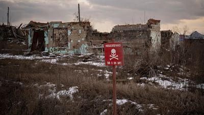 In the mine-riddled Ukrainian city of Izium, liberated civilians still pay the price of war