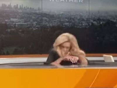 Terrifying moment TV meteorologist faints during live broadcast