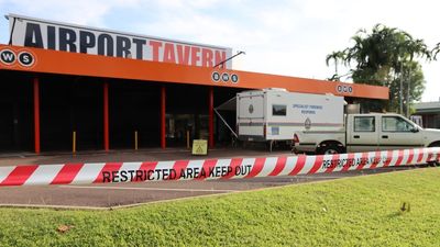 Man arrested after bottle shop worker stabbed to death at Darwin's Airport Tavern