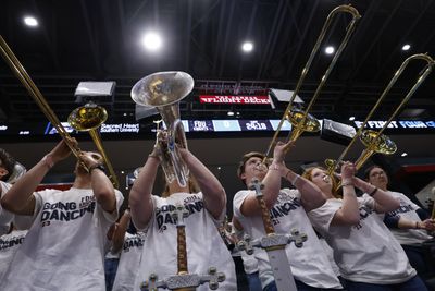 Dayton’s pep band stepped up to support Fairleigh Dickinson during its March Madness run and went all out