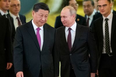 Ukraine-Russia news – live: Xi arrives in Moscow as China tells ICC to avoid ‘double standards’