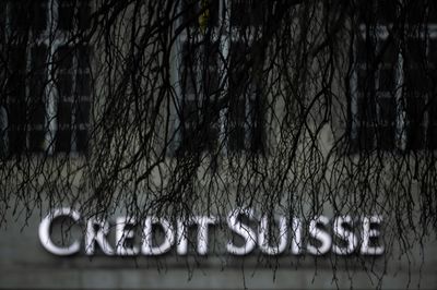 Stocks drop despite Credit Suisse buyout, central banks' pledge