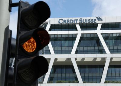 Credit Suisse shares slump 64% after UBS deal