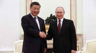 Putin Flaunts Alliance with Xi as ‘Dear Friends’ Meet in Kremlin