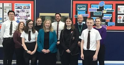 High school staff and pupils celebrate gold star from education inspectors