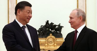 Putin tries to shut down global isolation claims by hosting China’s President Xi Jinping