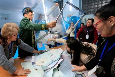 Kazakh ruling party wins snap poll, observers urge reforms