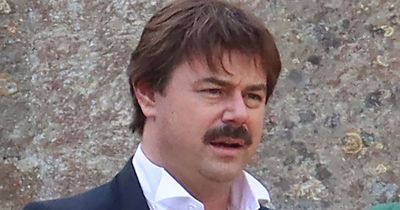 Danny Dyer unrecognisable with long hair and moustache as he films with David Tennant