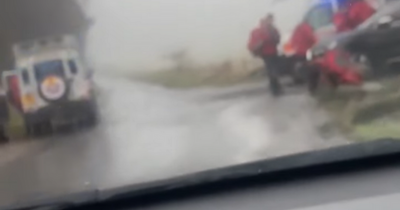 Footage shows huge mountain rescue and police presence as search continues for missing walker