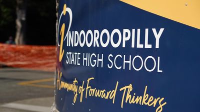 Woman who worked at Brisbane's Indooroopilly State High School charged with child grooming, indecent treatment offences