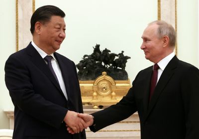 Xi calls Russia ties priority on Moscow trip