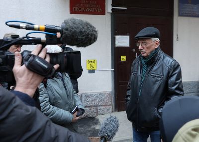 Russian police target Nobel Prize-winning group in mass raids
