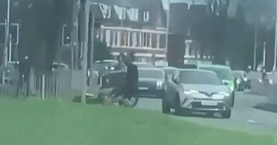 Scrambler riders knocked off bike as Porsche driver chases men in 'road rage'