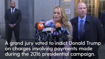 Why was Donald Trump indicted on criminal charges and what happened with Stormy Daniels?