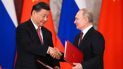 Day two of talks between Xi and Putin sees pledge to deepen strategic partnership
