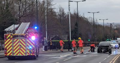 Road closed with firefighters scrambled as car catches fire on major route