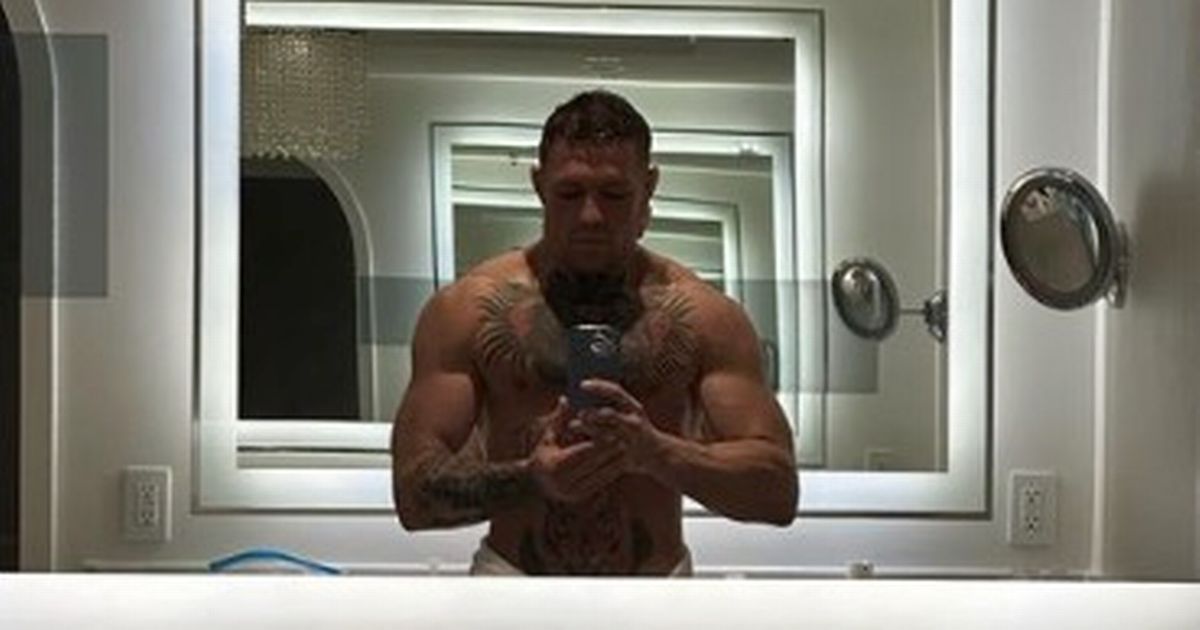 Conor McGregor urged to delete topless photo as UFC…