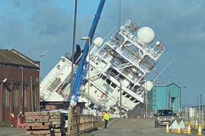 Ambulance service confirms 21 people in hospital after ship topples over