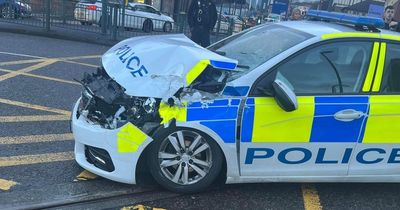 Police car left wrecked after smashing into tram