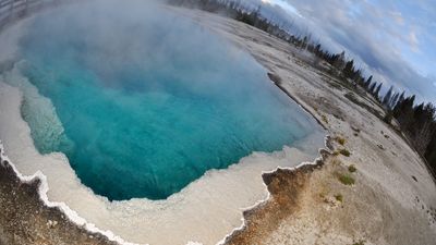 Careless Yellowstone hikers shamed for strolling alongside steaming hot spring