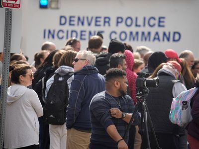 Denver school shooting - live: Fugitive student suspect named as two teachers shot and campus on lockdown