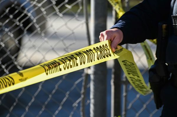 US student on run after shooting two school staff