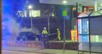 Edinburgh firefighters tackle car engulfed in flames at petrol station