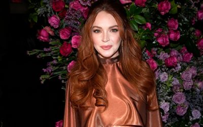 Lohan among stars to pay up over crypto case