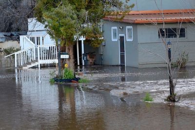 Rising floodwaters lead to more evacuation orders in Arizona