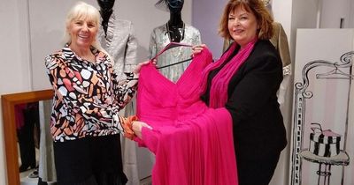 MSP donates mother of the bride dress to West Lothian charity shop and urges others to give support