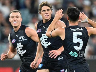 Carlton hold off Cameron's Cats in AFL thriller