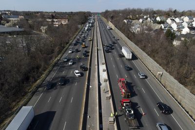 Police: Driver veered into highway work zone, killing 6