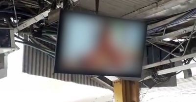 Commuters mortified as porn is screened at train station platform for three minutes