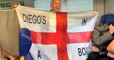 Fears for 'muppet' England fan's safety after as he holds flag with vile message
