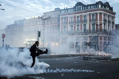 Violence flares as French protesters vent fury at Macron reform